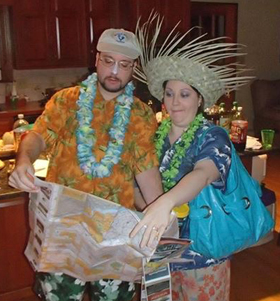 couple dressed for beach planning vacation