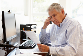 senior man on computer