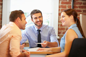 couple meeting with financial advisor