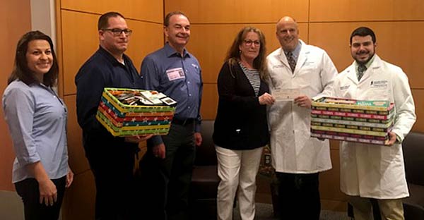 pediatric emergency room donation group photo