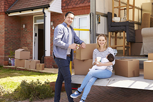 buyer's market - image of family moving into a new house