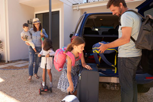 family packing vacation identity theft