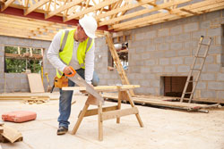 photo of contractor building a house
