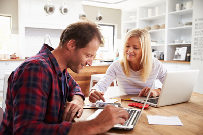 couple making plans with financial wellness tips