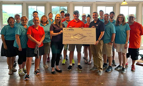 Diamond team presents a check for $26,500 to the American Cancer Society at the Relay For Life Golf Invitational.