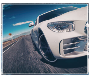 white sports car (representing fast auto express) on a road with blue skies and mountains behind inside a square shape