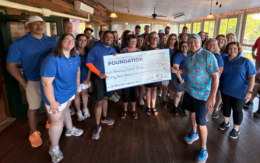 Diamond group photo with $53,000 big check from the 21st Charity Golf Invitational