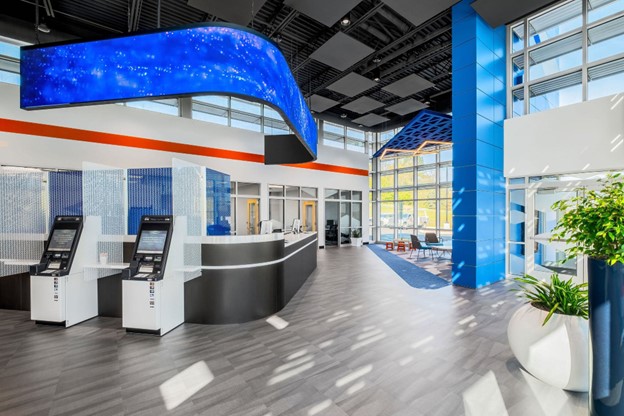 A interior photo of Diamond Credit Union's Cumru branch. The photo is from the back right corner of the room. The ITM machines are picture to the left, the front doors to the right and the service-first desk is in the middle.