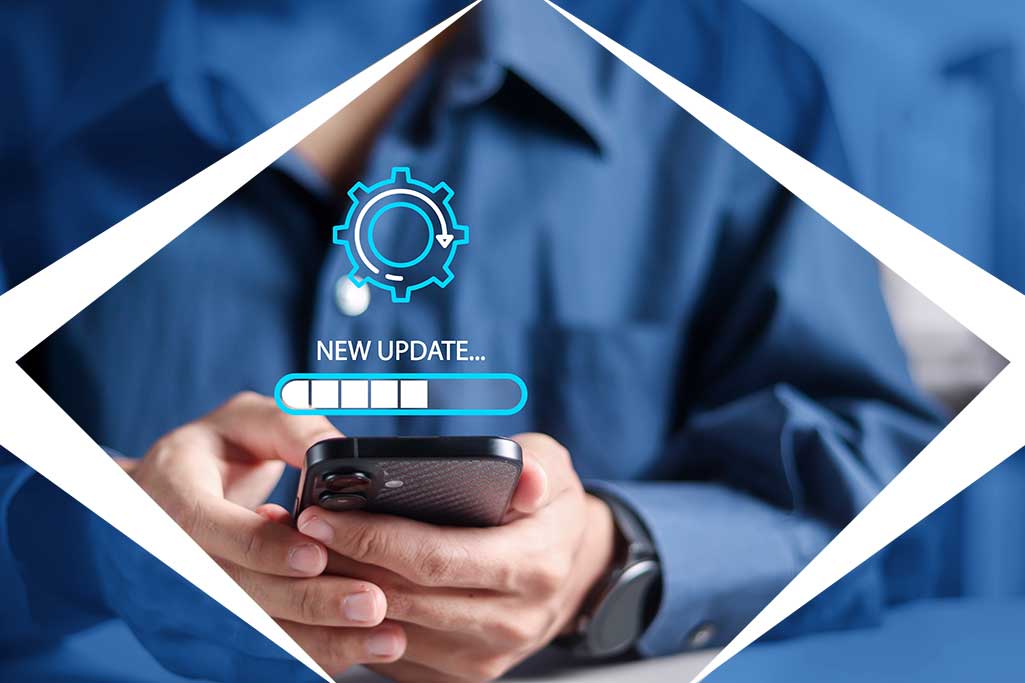 Someone is holding a cell phone. There is a bar above it that is loading with the word "Update" above it.