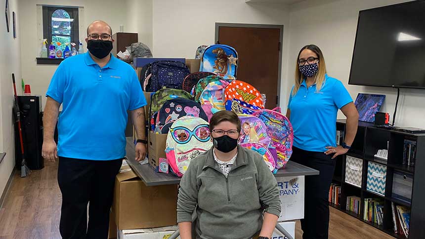 Photo - Diamond helps United Way: Edwin P. and Kylee A. (standing) delivered school supplies to Shannon F. at Big Brothers Big Sisters of Berks County as part of United Way Day of Caring.