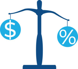 balance holding two circles, one with a dollar sign and the other with a percent sign.