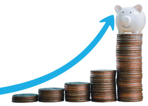 stack of increasing coins with a piggy bank on top and a blue arrow curving upward.